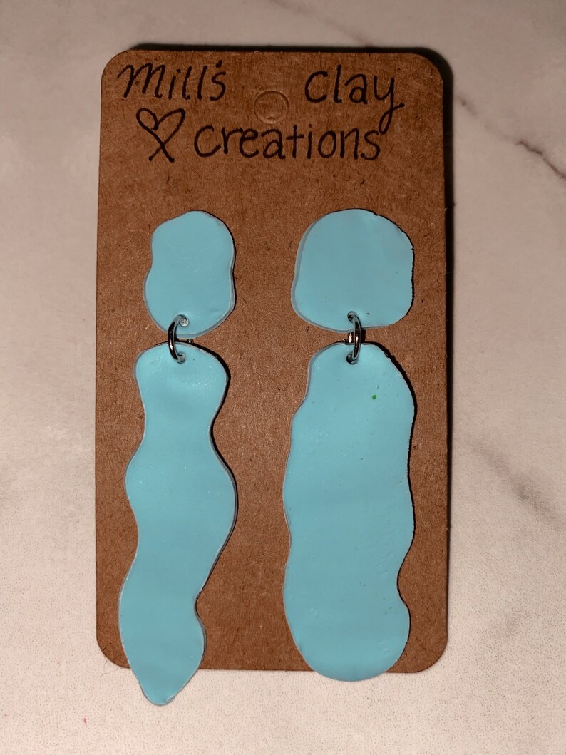 spilled blue milk earrings