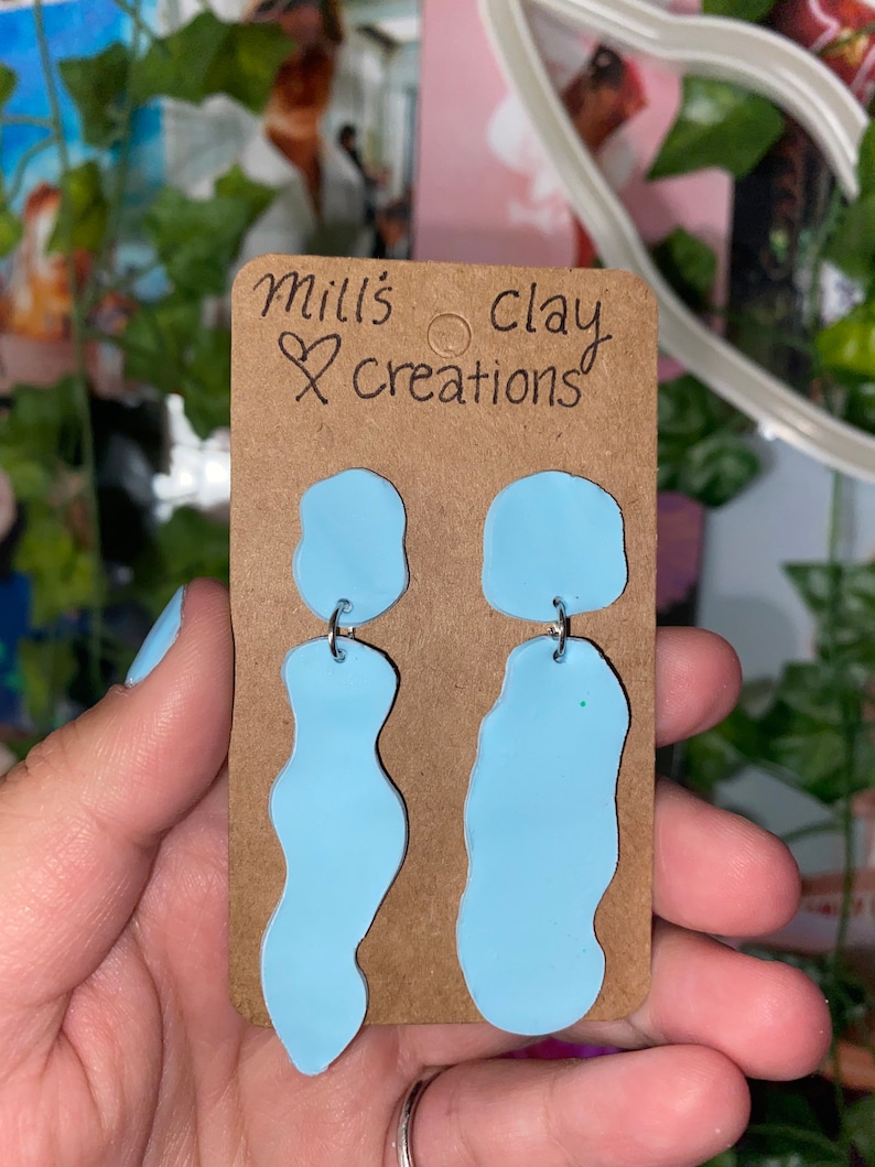 spilled blue milk earrings