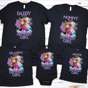 May include: Black t-shirts featuring a graphic of two animated girls, with text reading "Daddy of the Birthday Girl", "Mommy of the Birthday Girl", "Grandma of the Birthday Girl", "Auntie of the Birthday Girl", and a babygrow.
