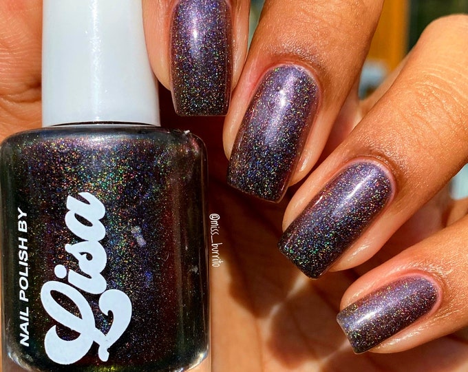 Witchcraft-aubergine nail polish with rainbow holographic sparkle