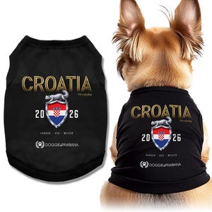 May include: Black dog t-shirt with "CROATIA" in gold lettering. Features a shield with the Croatian flag and the text "20 26". Includes the text "DOGGIE PAWBANA" and the text "CANADA USA MEXICO".