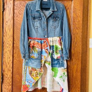 May include: A rustic wooden sign with the text "Welcome to our home" in white lettering. The sign features a distressed finish and a simple, inviting design, perfect for entryway decor.