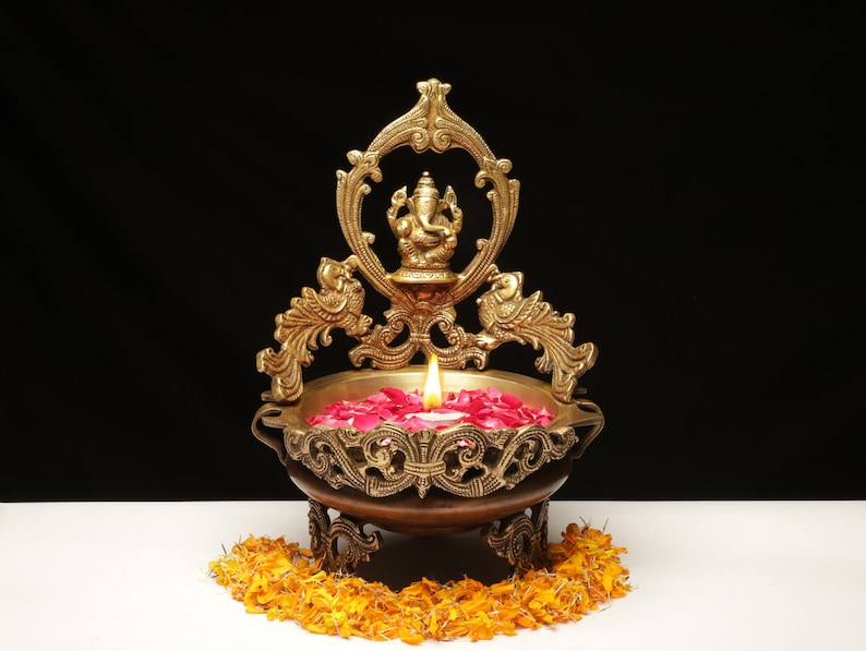Brass Ganesha Urli with Peacock
