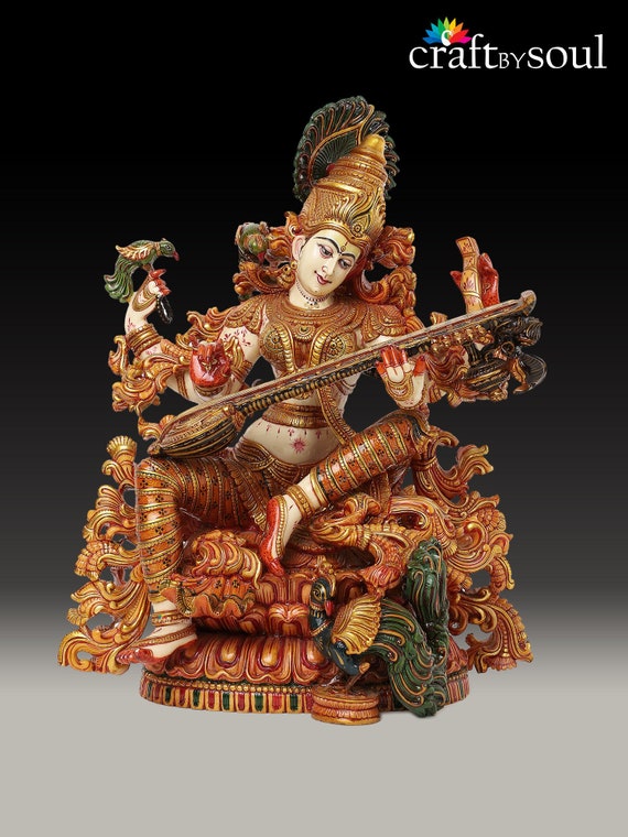 真鍮製サラスワティ知識の女神。最も美しく輝く顔を持つ il_fullxfull.3276451391_swnf.jpg