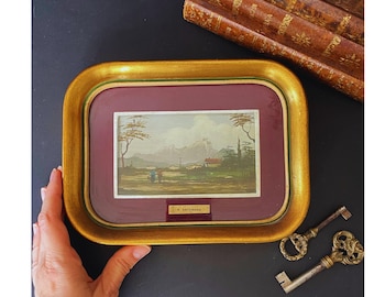 Pintura al óleo vintage de un paisaje montañoso italiano, firmada por Gattinara, con marco dorado.
