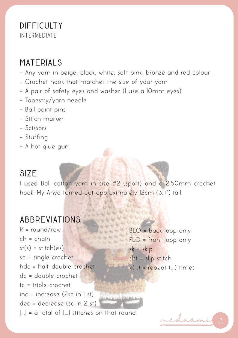 May include: Crochet pattern instructions for making a pink and beige amigurumi cat with black eyes. The pattern includes materials, abbreviations, and size information. The cat is approximately 12 cm (3.4 inches) tall.