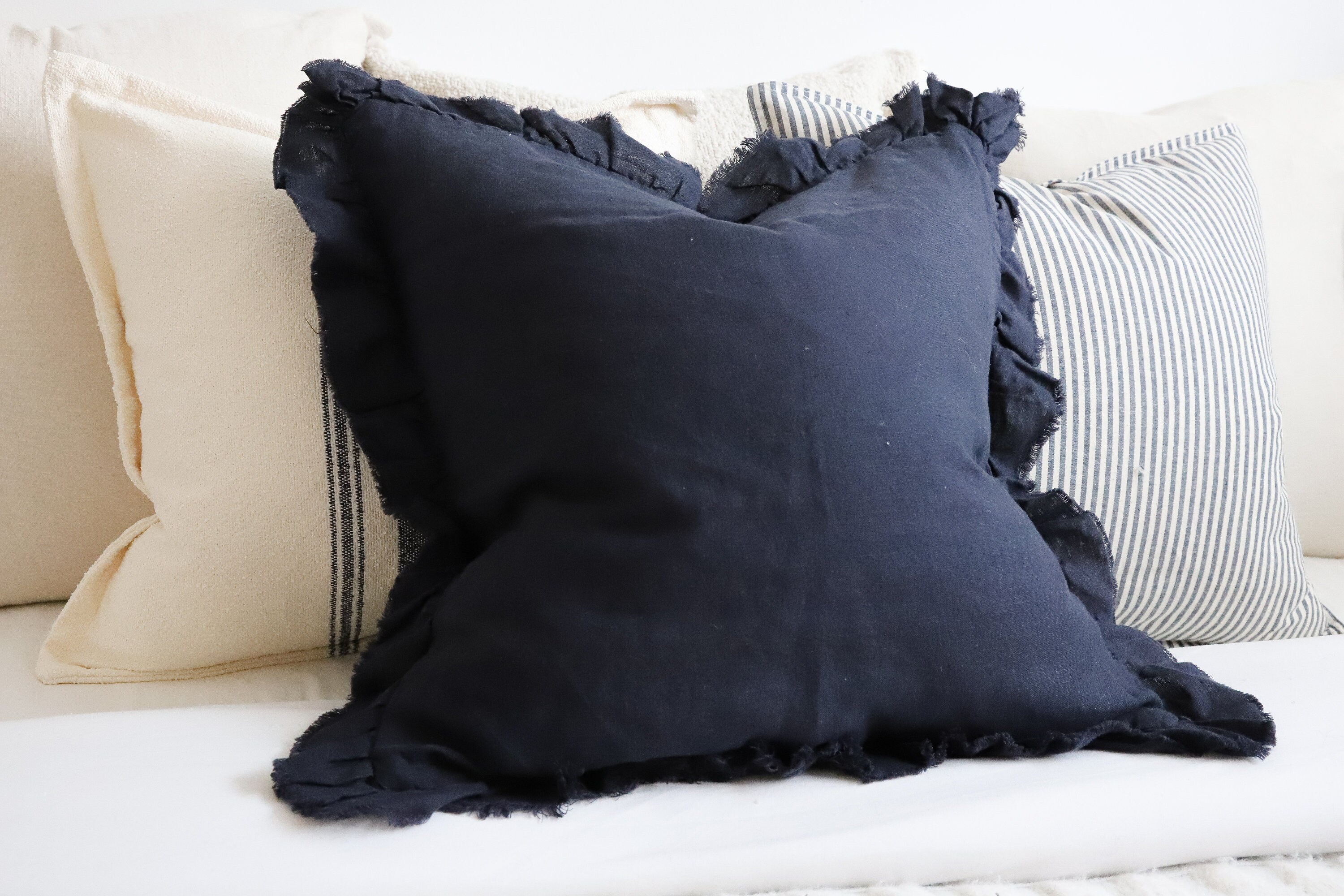 Navy tassel cushion hot sale