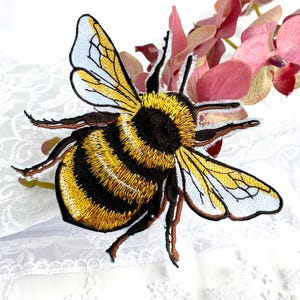Embroidered patch
bee patch
back patch
custom embroidery
insect patch
cute patch
bumble bee
iron on patch
custom iron on patch
patches for jackets
trucker hat patches
embroidered patches
hat patches