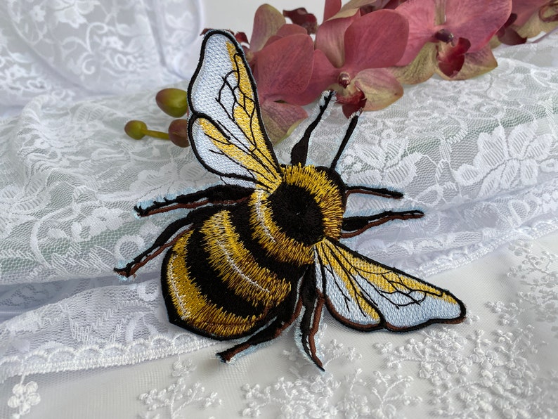 Embroidered patch
bee patch
back patch
custom embroidery
insect patch
cute patch
bumble bee
iron on patch
custom iron on patch
patches for jackets
trucker hat patches
embroidered patches
hat patches