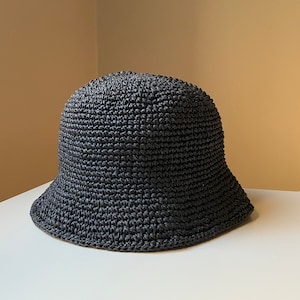 Trendy black raffia handmade crochet premium straw bucket sun hats, unisex summer beach vacation headwear