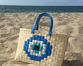 Handwoven evil eye bag with plastic, ideal for beach and shopping