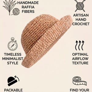 May include: A light brown, artisan hand-crocheted hat made from raffia fibers. The hat features a packable and foldable design with an optimal airflow texture. The image includes text that reads "Handmade Raffia Fibers", "Artisan Hand Crochet", "Timeless Minimalist Style", "Optimal Airflow Texture", "Packable and Foldable", and "Find Your Perfect Fit".