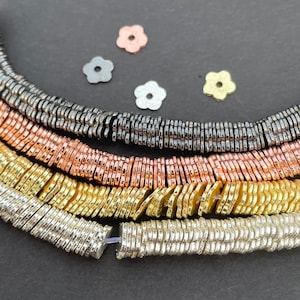 A Strand of Flower Disc, Gold Finish ,Silver Plated And Gunmetal E-coated, Brushed Copper spacers in Four Size: 6mm,8mm,10mm.