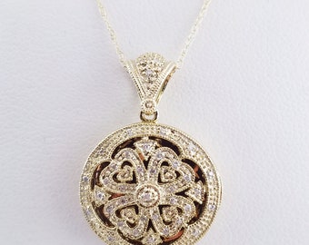 14k Yellow Gold Diamond Locket Holds 2 Photos 25mmx17mm 14k Yellow Gold Diamond Locket Holds 2 Photos 25mmx17mm