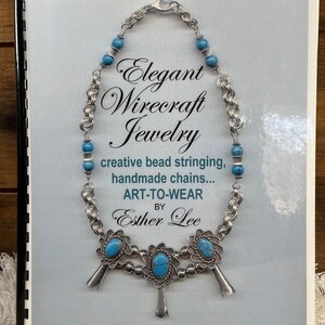 May include: A book titled "Elegant Wirecraft Jewelry: creative bead stringing, handmade chains... ART-TO-WEAR by Esther Lee" with a silver necklace featuring turquoise stones on the cover.