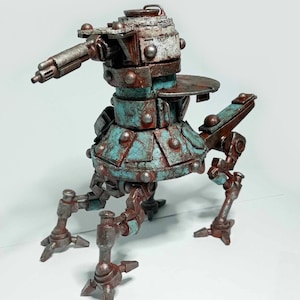 May include: A steampunk robot model with a gun, showcasing a distressed, metallic appearance. The robot has a layered body with teal and rust-toned details, and is supported by three articulated legs. The design suggests a vintage, industrial style.