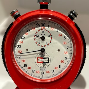 Heuer Trackmaster 63mm in diameter for the champion sparkplug company