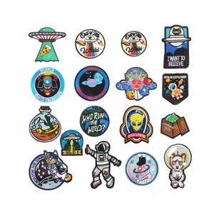 May include: A set of 16 embroidered iron-on patches featuring various space-themed designs, including aliens, planets, spaceships, and the words "I Want to Believe".
