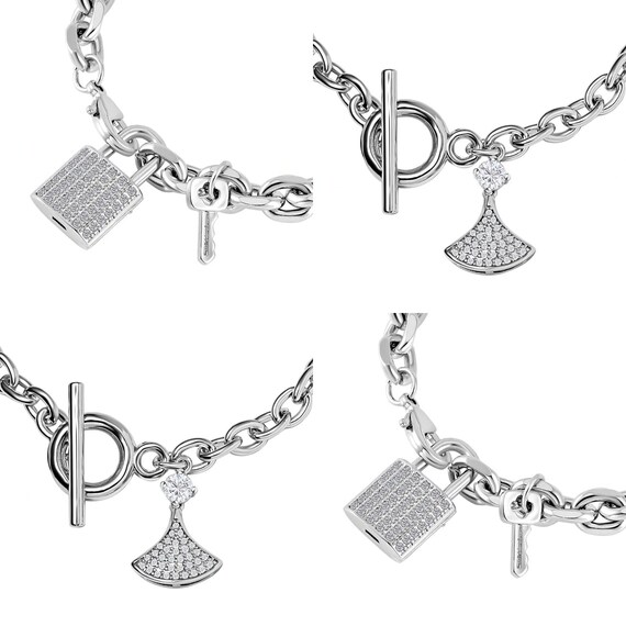Stunning Simulated Diamonds in Platinum Overlay Charm Bracelets.