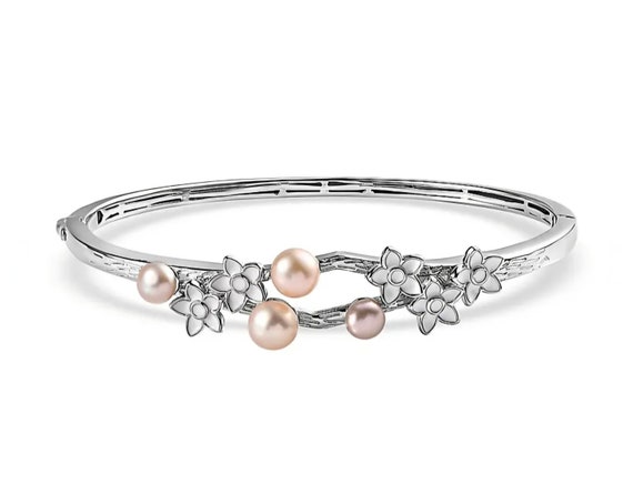 Stunning Natural Pearls in Platinum Plated Bracelet.