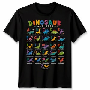May include: Black t-shirt with a colourful dinosaur alphabet design. Each letter of the alphabet is paired with a different dinosaur illustration, with the dinosaur names printed below. The word "DINOSAUR" is at the top.