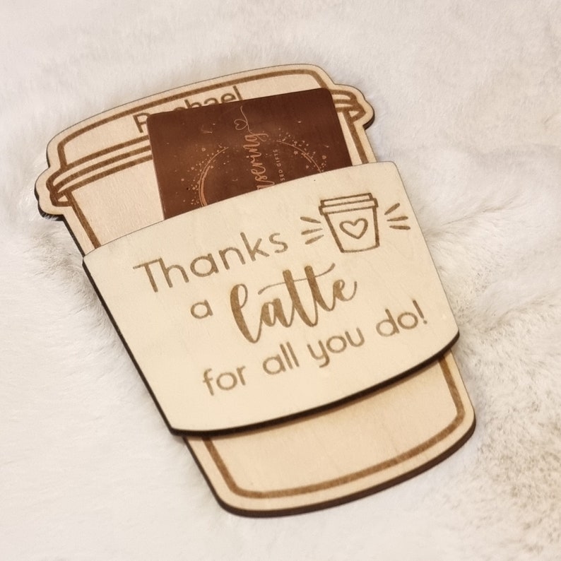 May include: A wooden coffee cup cutout with a gift card slot. The text reads "Thanks a latte for all you do!"
