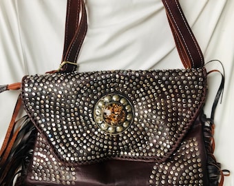 Leather bag with rivets