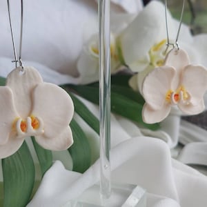 Dangling white Orchid earrings | polymer clay earrings | orchid earrings | Irish made earrings | Dúil | Irish jewellery | flower earrings