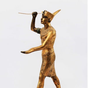 King Tutankhamun hunting hippo statue, The King as Harpooner, King tutankhamun statue, replica statue from king tut tomb.