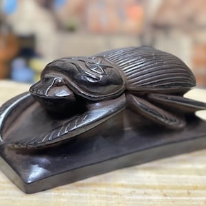 Ancient Egyptian scarab made from Basalt stone, Egyptian Scarab with Eye of Ra, Eye of Horus, Customized materials available.