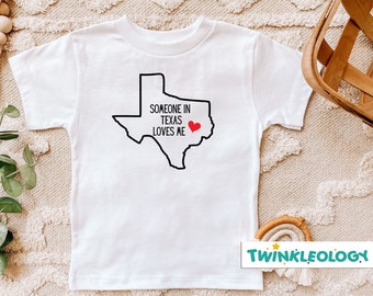 Someone In Texas Loves Me Baby Toddler Shirt, Texas Baby Clothes, Loved Baby Onesie®, Long Distance Baby Bodysuit, State Baby Onesie®