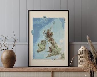 May include: A vintage-style map of the British Isles, printed in shades of green, brown, and blue, with the title "The Isles" at the top. The map is framed in black and displayed on a wooden shelf.