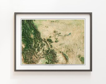 May include: A framed map of the Rocky Mountains with a 3D effect, showing the terrain in shades of green and brown.