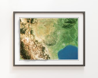May include: A framed map of a region with a variety of terrain, including mountains, forests, and a body of water. The map is in shades of green, brown, and blue.