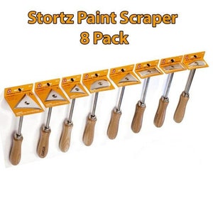 May include: Eight pack of triangle paint scrapers with wooden handles. The scrapers are labeled "Stortz Triangle Paint Scraper".