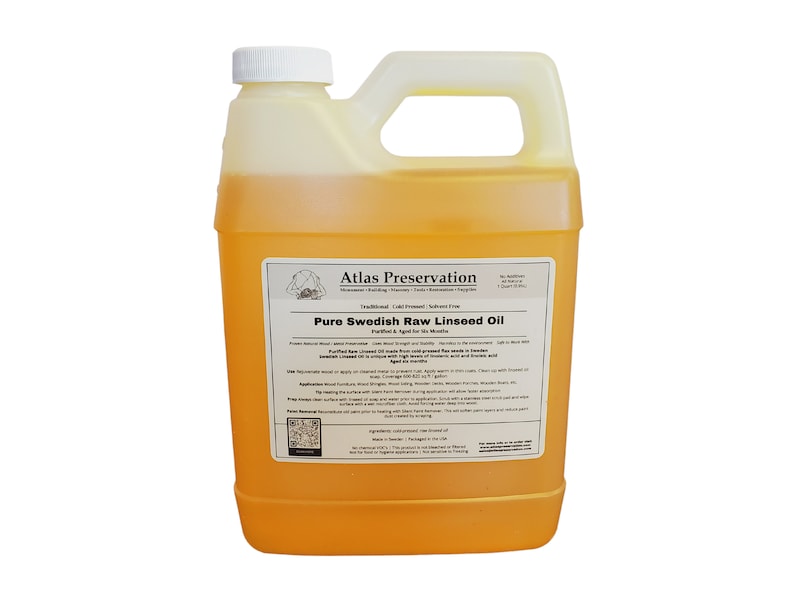 May include: A gallon jug of Atlas Preservation Pure Swedish Raw Linseed Oil. The label is yellow with black text and a logo of a person holding a paintbrush. The oil is a light yellow color.