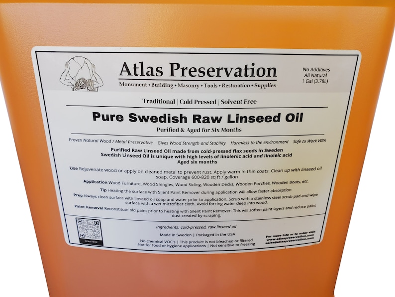 May include: A gallon jug of Atlas Preservation Pure Swedish Raw Linseed Oil. The label is orange and white and says "Traditional Cold Pressed Solvent Free" and "Purified & Aged for Six Months". It is made from cold-pressed flax seeds in Sweden and is all natural. The label also says "No Additives" and "1 Gal (3.78L)".