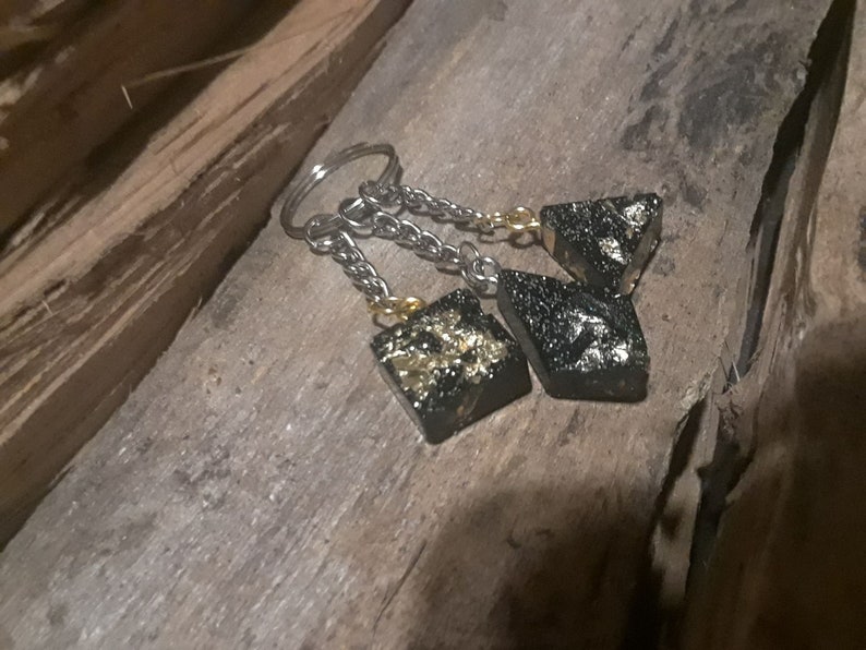 geometric black and gold keychain