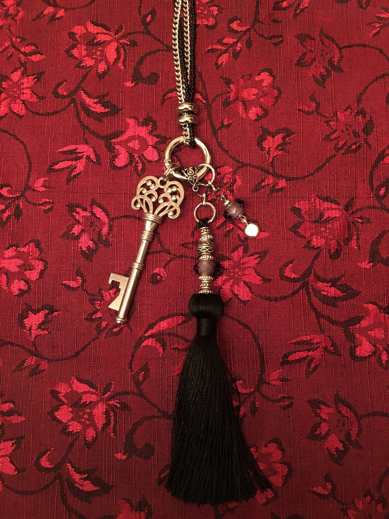 1920/'s length charm necklace