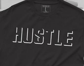 May include: Black t-shirt with the word "Hustle" printed in white outlined letters.