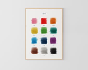 May include: A framed chart with the word "Colors" at the top. The chart shows 12 different colors with their names written below each color swatch. The colors are pink, red, orange, yellow, green, teal, blue, indigo, purple, brown, gray, and black.