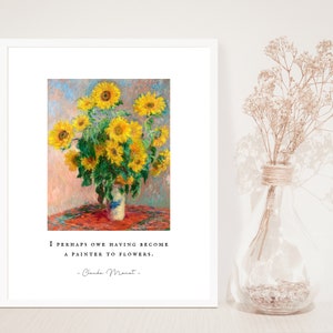 May include: A framed print of a painting featuring a bouquet of yellow sunflowers in a blue and white vase on a red and white tablecloth. The quote "I perhaps owe having become a painter to flowers. - Claude Monet -" is printed below the painting.