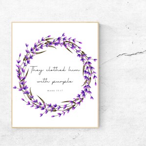 May include: A white background with a purple floral wreath and the text "They clothed him with purple" and "Mark 15:17".