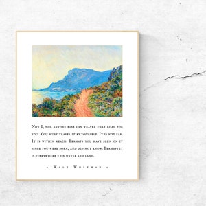 May include: A vintage-style print with a painting of a winding road leading to a mountain peak. The quote "NOT I, NOR ANYONE ELSE CAN TRAVEL THAT ROAD FOR YOU. YOU MUST TRAVEL IT BY YOURSELF. IT IS NOT FAR. IT IS WITHIN REACH. PERHAPS YOU HAVE BEEN ON IT SINCE YOU WERE BORN, AND DID NOT KNOW. PERHAPS IT IS EVERYWHERE - ON WATER AND LAND. - WALT WHITMAN -" is printed below the painting.