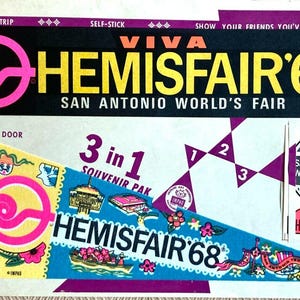 May include: Vintage souvenir pack for HemisFair '68, the San Antonio World's Fair. Includes a bumper strip, self-stick decal, and pennant. Features the fair's logo in pink and yellow, with the text "VIVA HEMISFAIR '68".