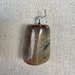 see more listings in the Petrified Wood Jewelry section