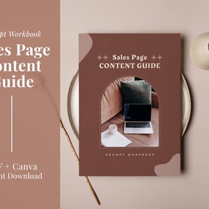 May include: A rectangular workbook titled Sales Page Content Guide with a dark brown cover featuring an arched window graphic. The center image shows a laptop, a white mug, and a notebook on a sofa. The text Prompt Workbook is printed below.