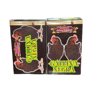 May include: Two boxes of "Gallina Negra" soap. Each box features a black chicken illustration with red comb and wattle. The boxes have gold and green text, with the words "Productos Misticos" and "Legitimo Jabon Original".