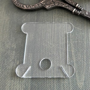 Clear Acrylic Bobbins w/holes, Unlabeled