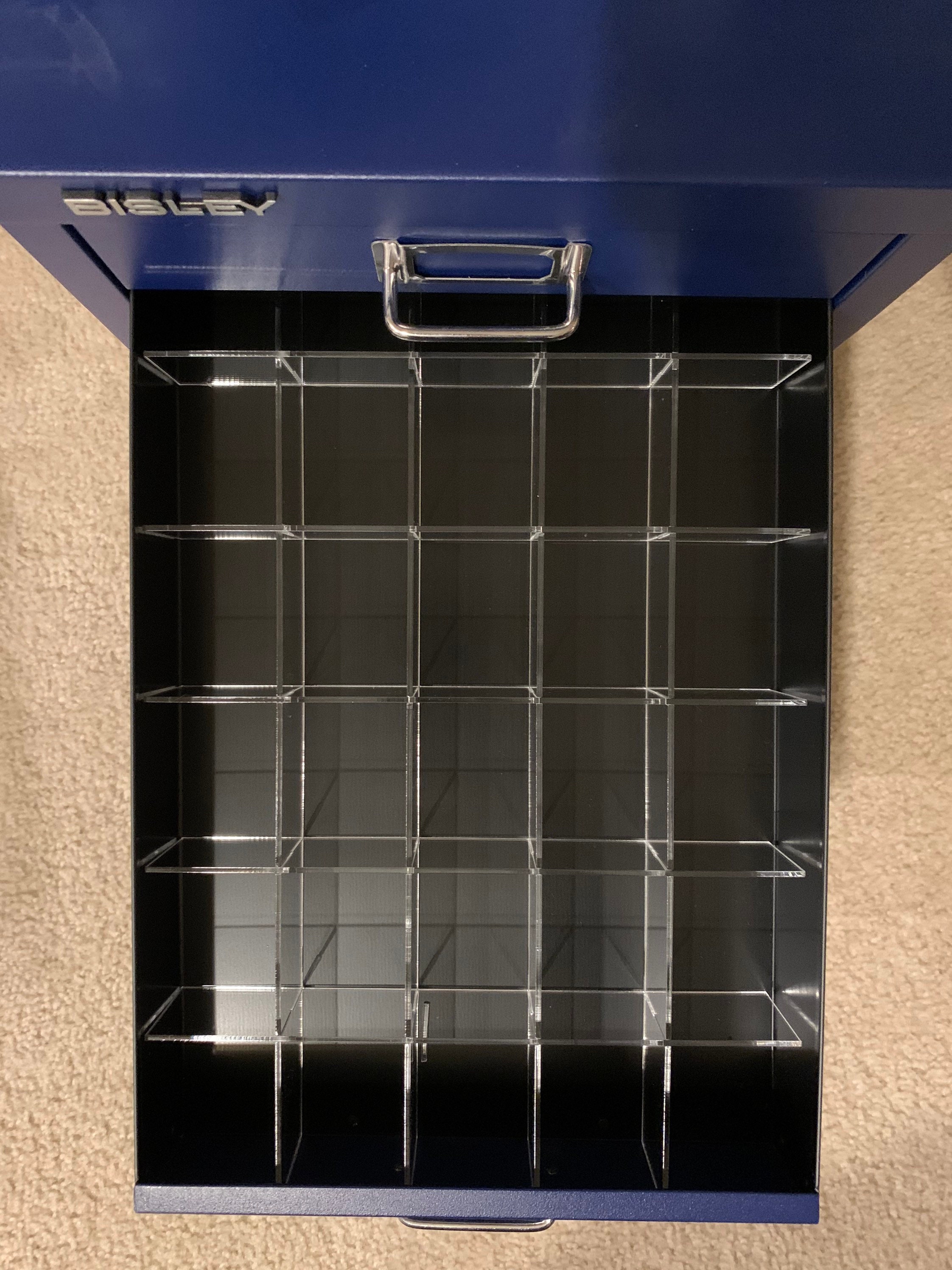 Acrylic drawer dividers maximize the use of this drawer for ties
